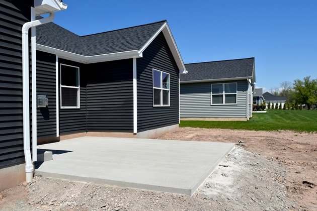 Smooth, finished concrete slab ready for a new home construction